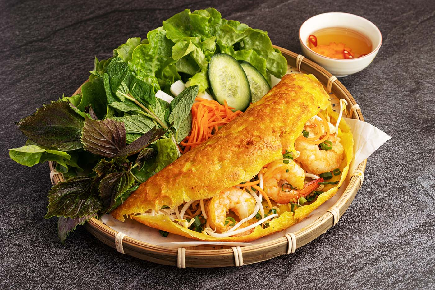 Banh Xeo served with chili padi and fish sauce